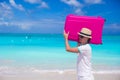 Portrait of happy man carrying his luggage on summer vacation Royalty Free Stock Photo