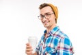 Portrait of a happy man with glasses cocktail and hat