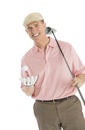 Portrait Of Happy Man With Golf Club And Ball Royalty Free Stock Photo