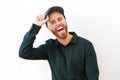 Happy man with hat laughing against isolated white background Royalty Free Stock Photo