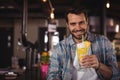 Portrait of happy man having milkshake Royalty Free Stock Photo