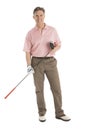 Portrait Of Happy Man Holding Golf Club Royalty Free Stock Photo