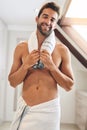 Portrait, happy man and shower in bathroom with towel for hygiene, morning routine and healthy skincare. Handsome, clean Royalty Free Stock Photo