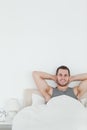 Portrait of a happy man waking up Royalty Free Stock Photo