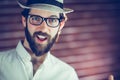 Portrait of happy man wearing hat and eyeglasses Royalty Free Stock Photo