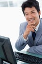 Portrait of a happy manager using a computer Royalty Free Stock Photo