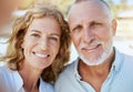 Portrait of happy mature caucasian couple taking a selfie while bonding together on holiday outdoors. Loving husband and Royalty Free Stock Photo