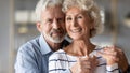 Portrait of happy mature couple hug showing love and care Royalty Free Stock Photo