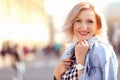 Portrait of happy mature woman on street Royalty Free Stock Photo