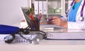 Portrait of happy medical doctor woman in office