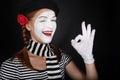 Portrait of a happy mime comedian showing OK Royalty Free Stock Photo