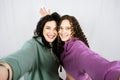 Portrait of happy mom and teen daughter spend time together. Teenage girl hugging her mother and having fun together Royalty Free Stock Photo