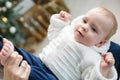 Portrait of happy mother and adorable baby celebrate Christmas.