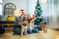 Mother, father and baby holding bauble Royalty Free Stock Photo