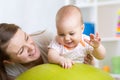 Portrait of happy mother and her baby in gym Royalty Free Stock Photo