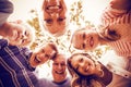 Portrait of happy multi-generation family forming a huddle in park Royalty Free Stock Photo