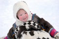 Portrait of happy Nenets girl in national Northern dress