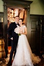 portrait of happy newlyweds in the interior. event planner services.