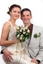 Portrait of happy newlyweds on white background