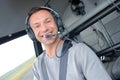 portrait happy pilot in cockpit Royalty Free Stock Photo