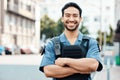 Portrait, happy or policeman in city with arms crossed for law enforcement, surveillance or street safety. Confident cop