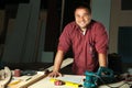 Portrait of happy professional carpenter. Royalty Free Stock Photo