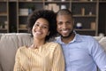 Portrait of happy relaxed young african american family couple. Royalty Free Stock Photo