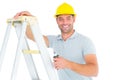 Portrait of happy repairman with pliers climbing ladder Royalty Free Stock Photo