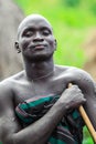 Portrait of Happy and Satisfied African Man with Traditional dress in the local Mursi tribe village
