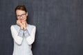 Portrait of happy satisfied young woman being in anticipation Royalty Free Stock Photo