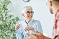 business office discussion teamwork senior meeting businesswoman colleague woman vitality elderly happy Royalty Free Stock Photo