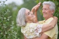 Portrait of happy senior couple dancing in park Royalty Free Stock Photo