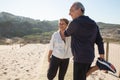 Portrait of happy senior couple doing physical exercises Royalty Free Stock Photo