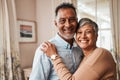 Portrait, happy and senior couple in home living room for bonding together. Face, elderly man and Indian woman in lounge Royalty Free Stock Photo