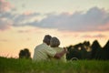 Portrait of happy senior couple in summer park Royalty Free Stock Photo