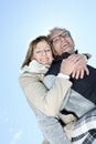 Portrait of happy senior couple in winter season Royalty Free Stock Photo