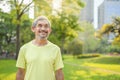 portrait happy senior male relaxing in the city park after exercise Royalty Free Stock Photo