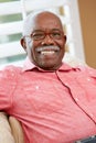 Portrait Of Happy Senior Man At Home Royalty Free Stock Photo