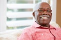 Portrait Of Happy Senior Man At Home Royalty Free Stock Photo