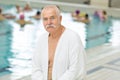 portrait happy senior man swimming in pool Royalty Free Stock Photo