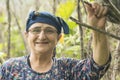 Portrait of a happy senior muslim woman with eyeglass at pumpkin