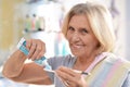 Senior woman brushing her teeth Royalty Free Stock Photo