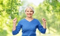 Portrait of happy senior woman celebrating success Royalty Free Stock Photo