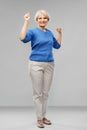 Portrait of happy senior woman celebrating success Royalty Free Stock Photo