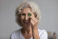 Portrait of happy senior woman recommend using parsley Royalty Free Stock Photo