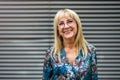 Portrait of a happy senior woman standing outdoors Royalty Free Stock Photo