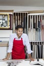 Portrait of a happy skilled worker in workshop