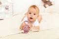 Portrait of happy smile baby relaxing on the bed Royalty Free Stock Photo