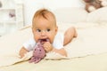 Portrait of happy smile baby relaxing on the bed Royalty Free Stock Photo