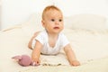Portrait of happy smile baby relaxing on the bed Royalty Free Stock Photo